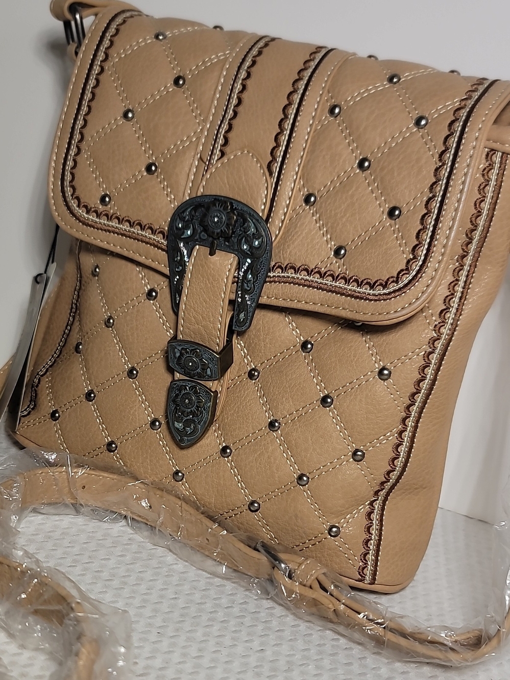 Quilted Tan Crossbody Bag with Decorative Buckle